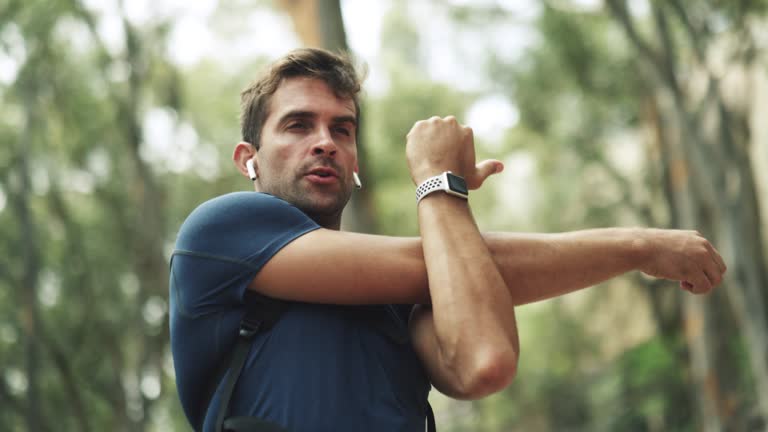 4k video footage of a man stretching before his run